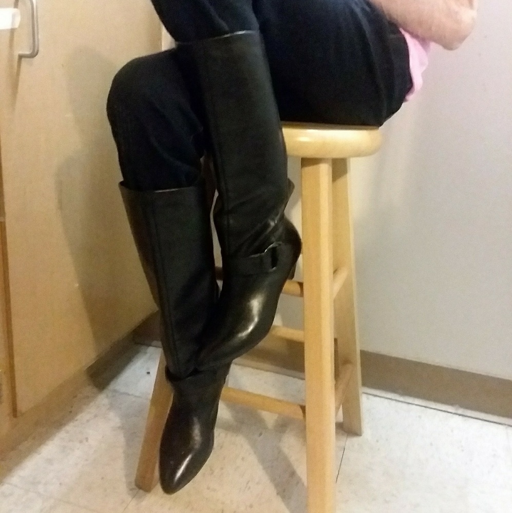 Black leather boots by Marc Fischer